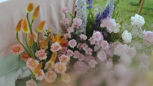 Elegant Floral Arrangement at Outdoor Wedding Ceremony