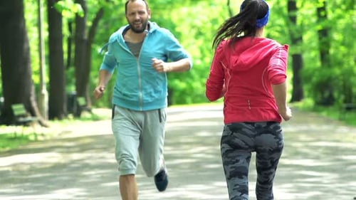 People Jogging In City Park, Super Slow Motion