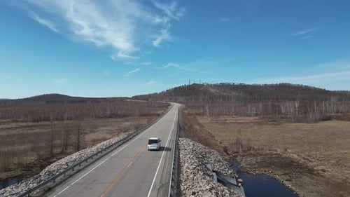 White Van Driving on Rural Road, Aerial Shot