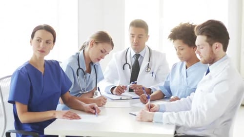 Hospital, Profession, People and Medicine Concept - Group of Doctors Meeting On