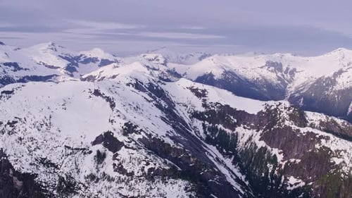 British Columbia, Canada Circa-2018. Aerial View of Snow Covered Mountain Range