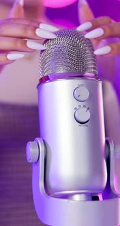 Microphone, girl hands and ASMR in studio for scratch, social media or influencer by neon lights