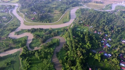 Aerial view green scenery of Sungai Perai river and rural residential