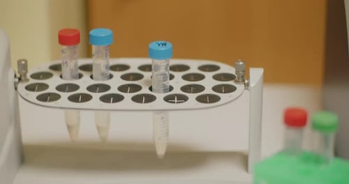 Scientific Centrifuge Mixing Sample Tubes in Laboratory