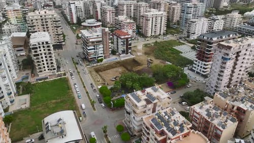 Aerial View Excavators Digging Foundation in a TimeLapse on a Construction Site