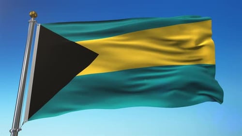 Waving Flag of The Bahamas Against a Blue Sky