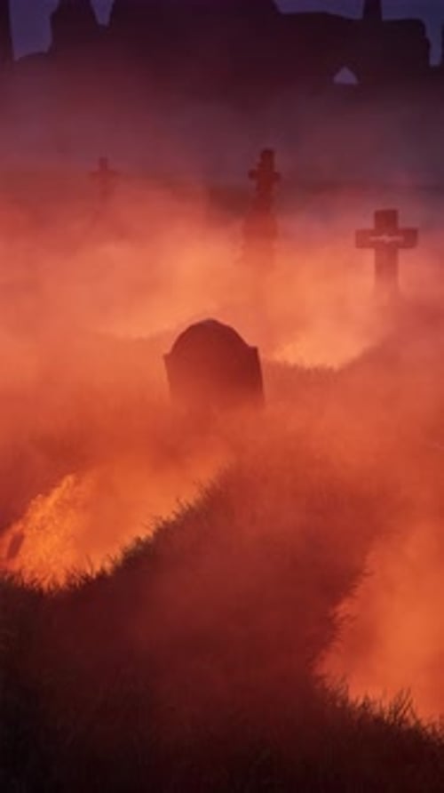 An old, abandoned cemetery with headstones jutting out in all directions