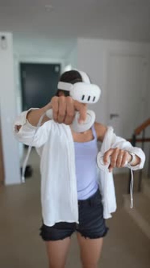 Woman Immersed in Virtual Reality at Home