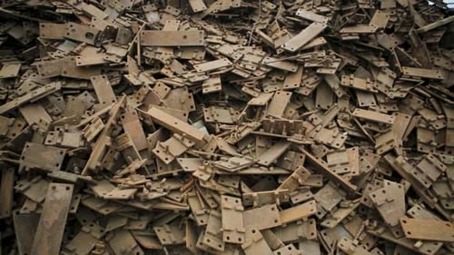Pile of rusty metal parts, a representation of recycling or industrial waste