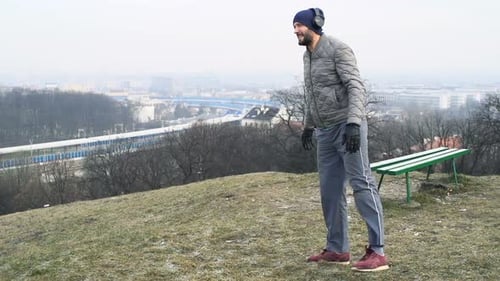 Man, Jogger Stretching Legs in City Park 30s