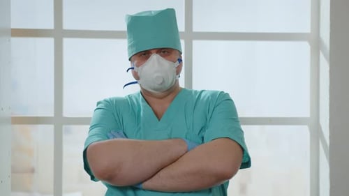 Healthcare Worker Poses with Arms Crossed