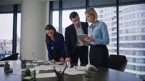 Group Business People Planning Strategy Reviewing Documents at Office Table