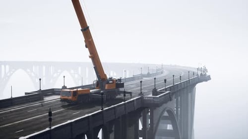 Gran grúa automotriz en el puente en construcción