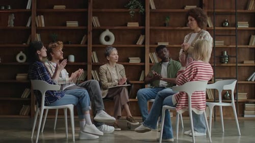 Black Woman Talking in Therapy Circle