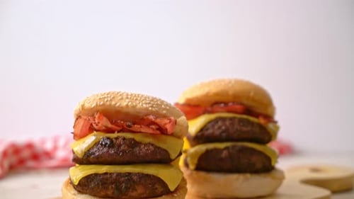 Stacked Cheeseburgers on Wooden Serving Board