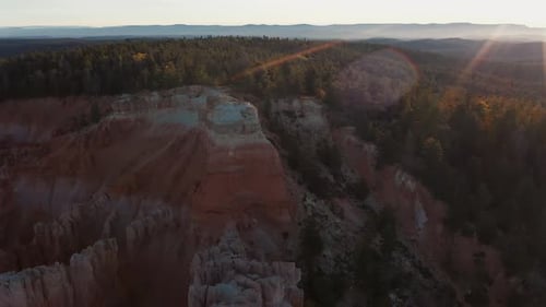 sandstone cliffs formations in Utah, USA. Soil erosion, geology, rocks. Orbiting aerial view