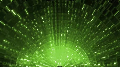 Vibrant green tunnel of light and abstract geometric shapes