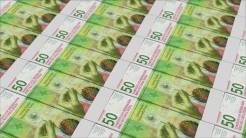 50 SWISS FRANC banknotes printing by a money press