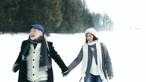 Senior Couple On A Walk On Winter Day.