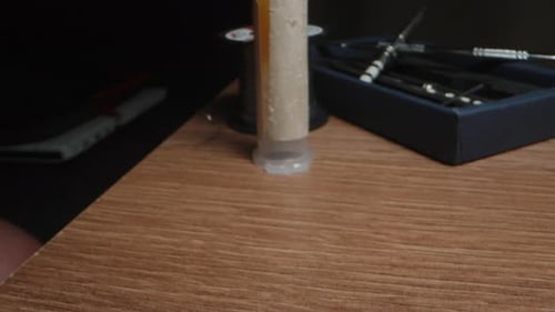 I apply solder to the soldering iron and solder the charging connector. close-up.