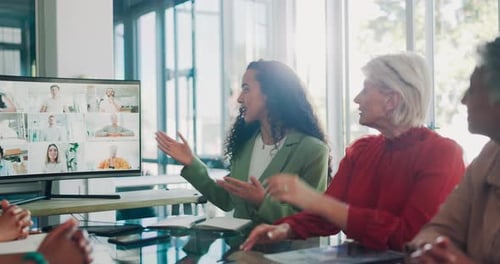 Team Having a Video Conference in Office
