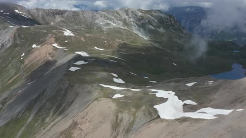 Aerial tilt up of beautiful mountain landscape