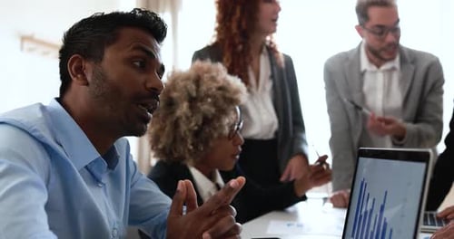 Multiracial business teamwork and startup meeting inside a modern bank office in USA