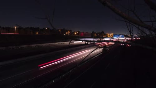 High speed fast moving night driving light trails motorway rapid data concept