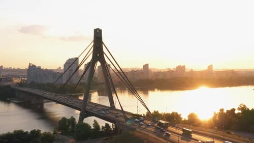 Urban Scape with a Kyiv River Bridge with Moderate Car Traffic