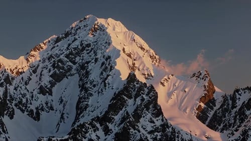 Snowy Mountain Peak at Golden Hour