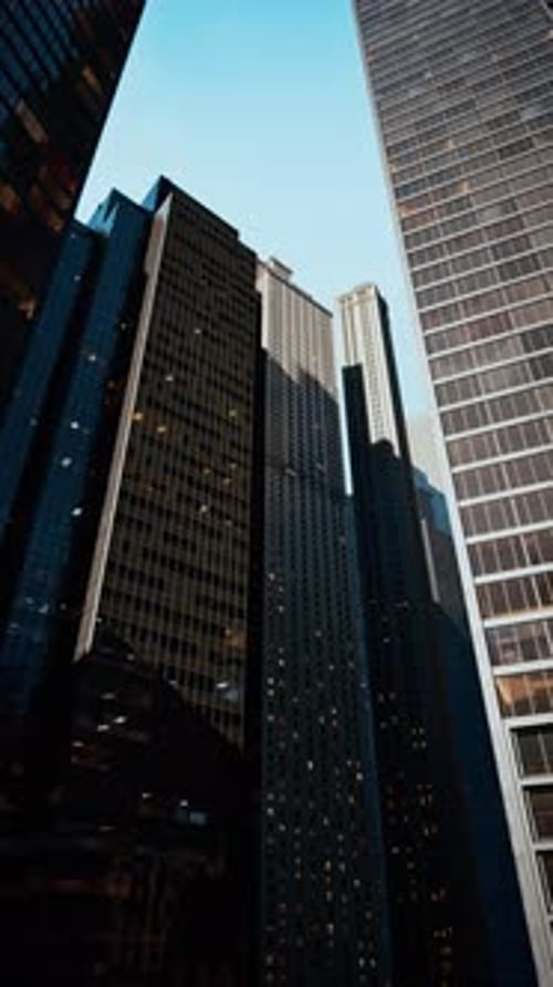 Modern Corporate Skyscrapers Panning Upward in a Vertical Frame