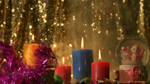 Candles and Christmas Decorations creating a festive scene