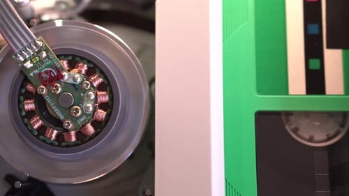 VHS Video Cassette Tape and Magnetic Head, Inside of Player, Starting Playback or Recording, Close U