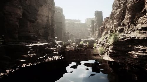 the River Flowing Through the Valley of Huge Red Rocks