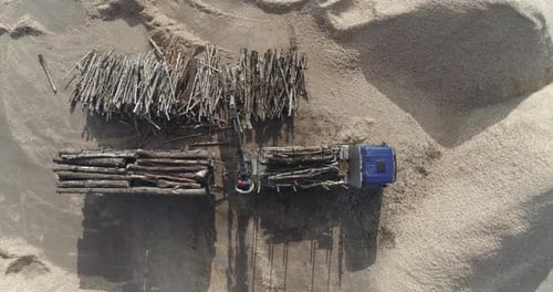 Woodworking Aerial View Recycling of Tree Trunks Into Splinters Unloading Logs From a Truck Wood