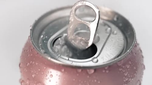 Soda Can Opening with Bubbles and Foam