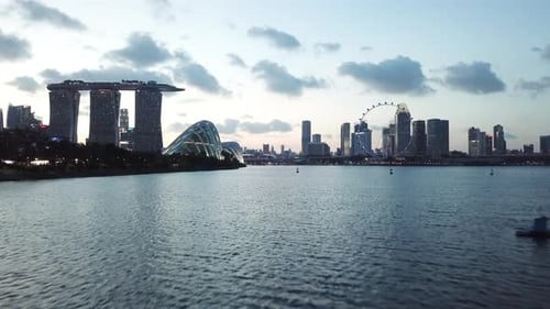 Singapore Skyline Sunset Marina Bay Sands Panning Forward, Aerial 4K