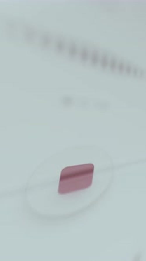A Finger Presses the Digital Stop Recording Button