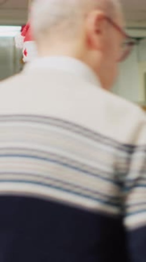 Vertical Video Employee Checking Clothing Price Tags