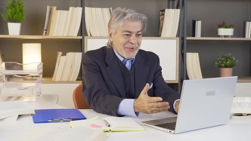 Successful businessman working happily.
