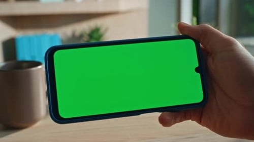 Finger Tapping Horizontal Chroma Key Mobile Phone at Remote Office Close Up