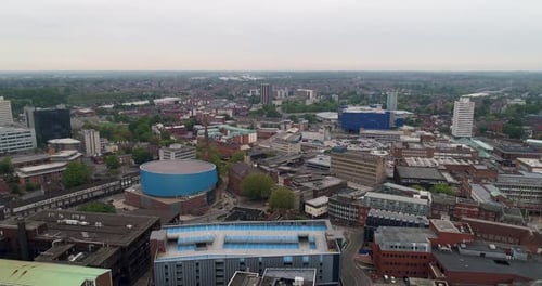 Aerial pan above Coventry City looking West