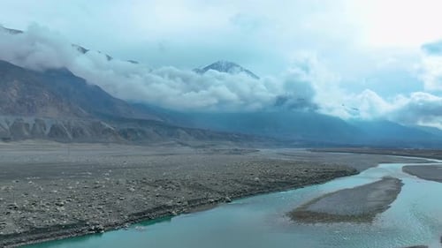 Nomal Valley covered with clouds in Gilgit, Pakistan. Aerial shot.