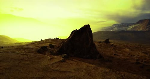 Golden Hues Fill the Air As the Sun Sets Behind Distant Mountains