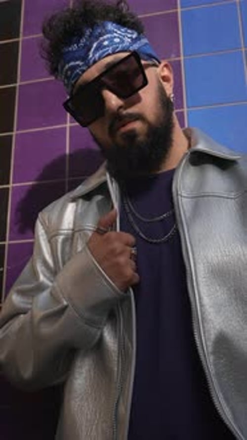 Stylish Bearded Man with Headband and Sunglasses in City