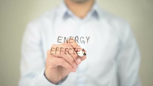 Energy Efficiency, Man Writing on Transparent Screen