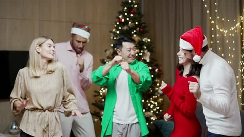 Friends Dancing at Christmas Celebration Party