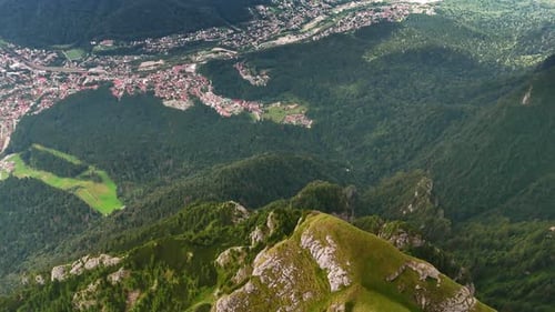 Flight over the mossy rocks of the huge mountain.