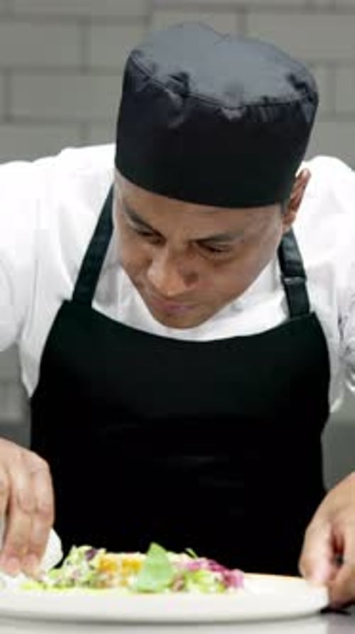 Clean plate, man and chef in restaurant kitchen, fine dining and commitment to industry
