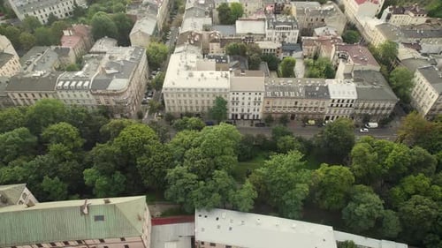 Aerial View of Neighborhood of Krakow Old City in Poland Europe at Sunrise, Flying over Empty Urban